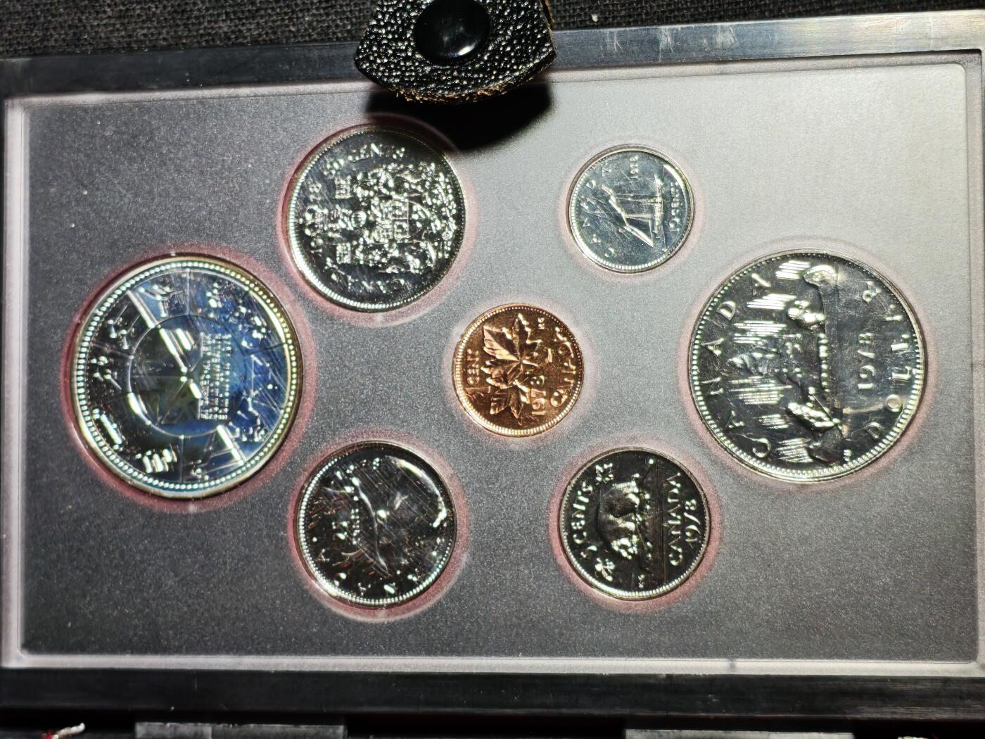 刘世昌艺术品销售中心～虎踞龙蟠*金杨在线联拍群第519期 加拿大1978年《英联邦运动会》原装精铸币一套7枚，其中壹枚1元是银币，重23.33克。原盒证，品相如图。