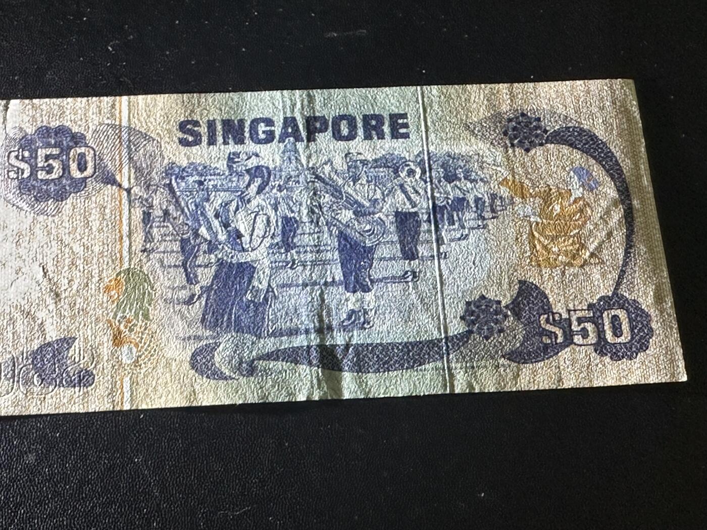 《外钞收藏家》第六百一十九期（精品场）（长期征集拍品、欢迎藏友们联系合作） 新加坡鸟版50元 非全新 品相如图