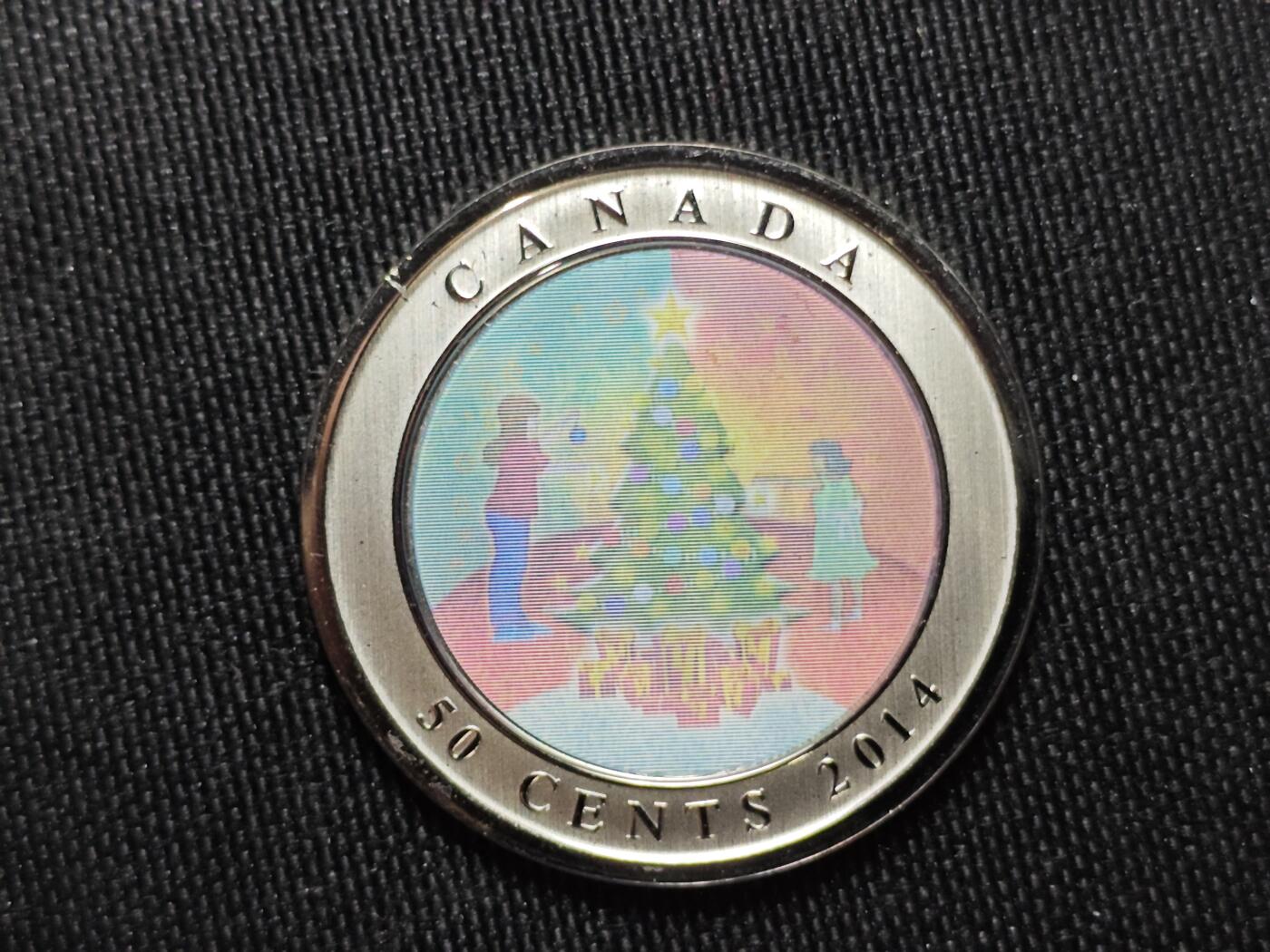 KK钱币收藏小铺   套币专场 2月预留时间 周末发货  2014加拿大50分 幻彩纪念币 带盒
