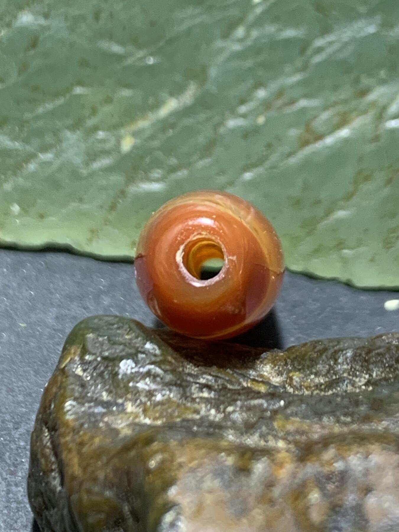 精美高玉化柿子红玛瑙天眼纹桶珠一颗，