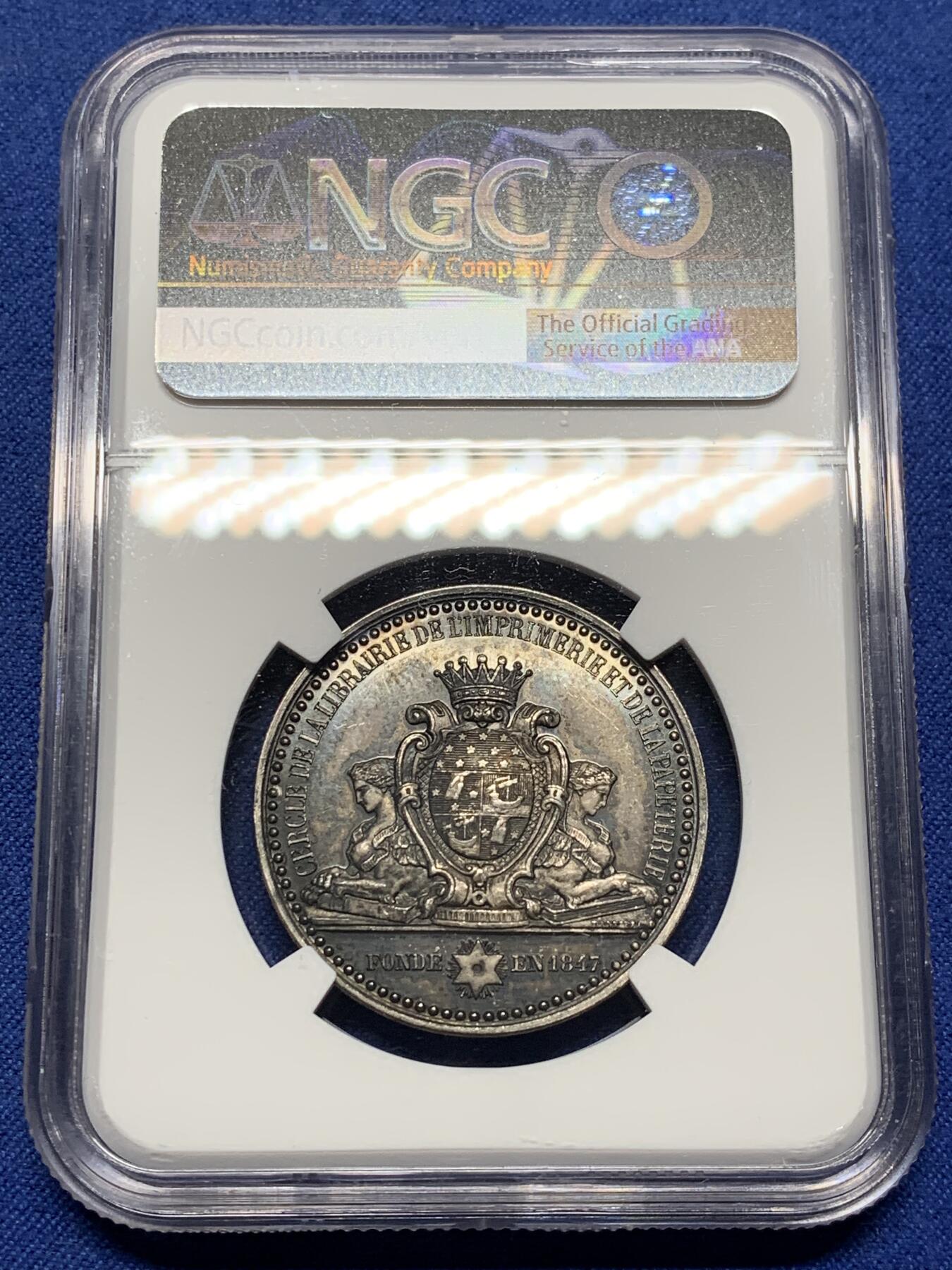 《竞宝斋》第472场 周日，周一，周二 3场连拍 （全场包邮）欢迎送拍 NGC MS62 法国巴黎书商、印刷和文具协会银质代币，书商和印刷商的手臂由狮身人面的格里芬守护