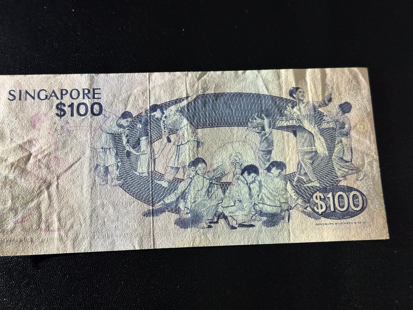 《外钞收藏家》第六百一十九期（精品场）（长期征集拍品、欢迎藏友们联系合作） 新加坡鸟版100元 非全新 品相如图 BWC版 非常精美