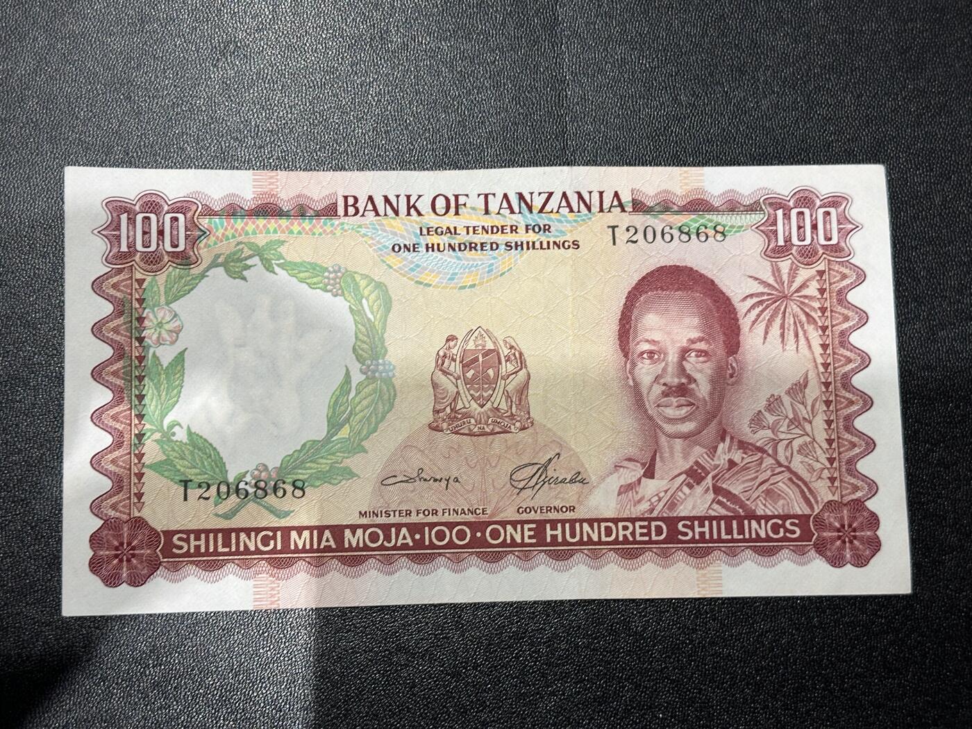 《外钞收藏家》第六百一十九期（精品场）（长期征集拍品、欢迎藏友们联系合作） 坦桑尼亚100先令 无47靓号 AU品相 尾868