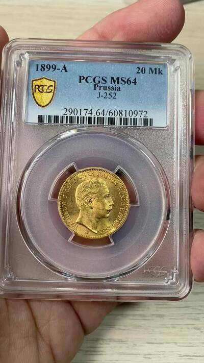 万国钱币拍卖第063期 PCGS MS64 1899年德国普鲁士威廉二世长翅流通20马克金币 早期年份强烈黄金转光顶级状态 7.96g 900金