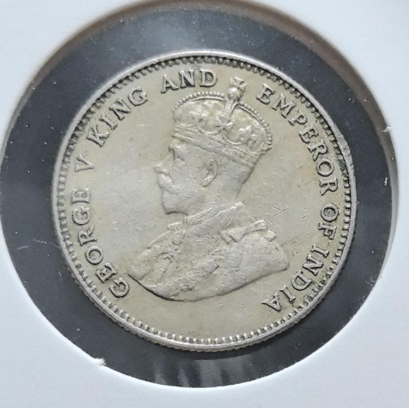 外国优质老铜币银币苏联纪念章，每周六晚九点倒数截拍，满百包邮可寄存，持续收拍 香港1935年一毫，正面为英王乔治五世像并标注 “印度皇帝”，背面是中英文 “香港一毫”，见证了香港作为英国殖民地时期的货币体系与中英文化交融的历史。