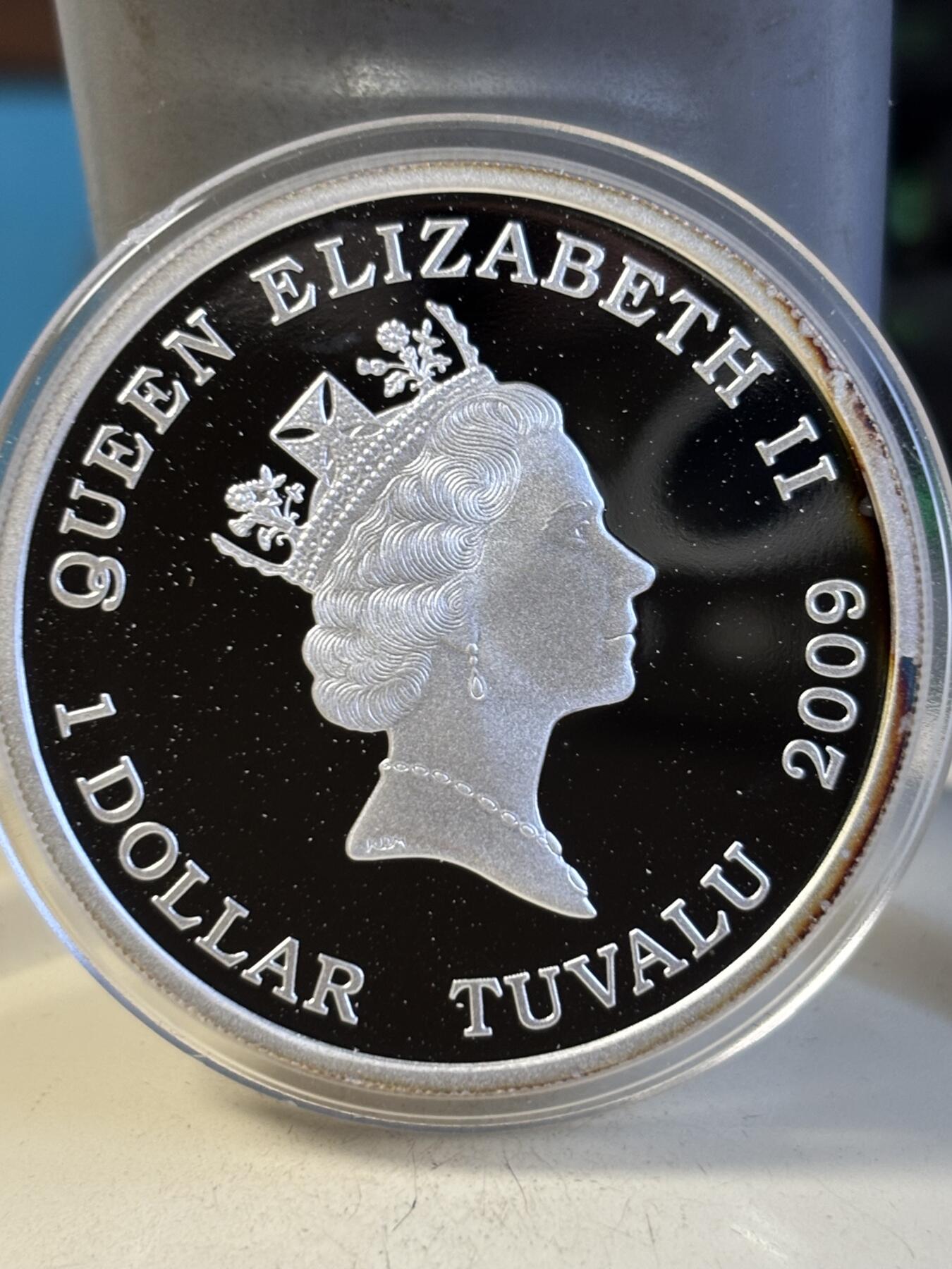 第194期拍卖 图瓦卢2009年芭比娃娃诞生50周年1盎司纪念彩银币,9999银，发行20000枚，有氧化