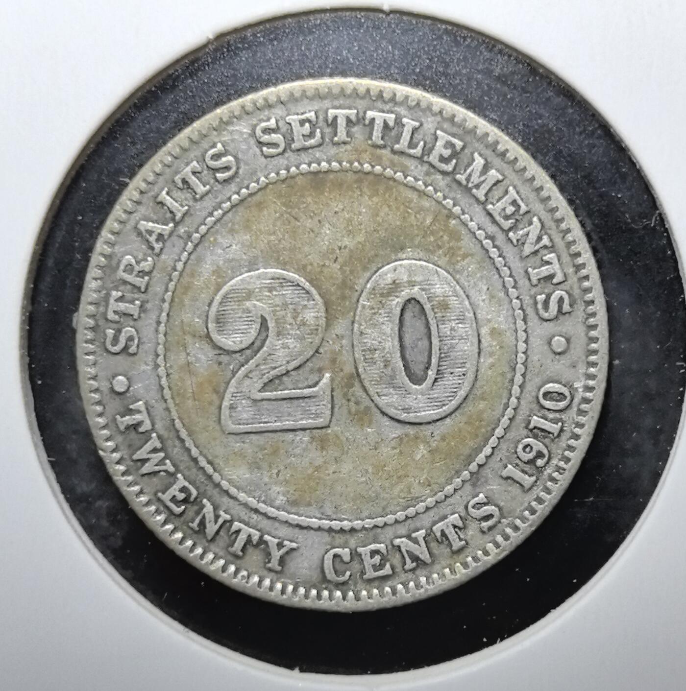 外国优质老铜币银币苏联纪念章，每周六晚九点倒数截拍，满百包邮可寄存，持续收拍 英属海峡殖民地1910年20分银币，正面为爱德华七世头像及 “国王与皇帝” 头衔，背面标注面值，是英国殖民东南亚时期的典型流通货币。