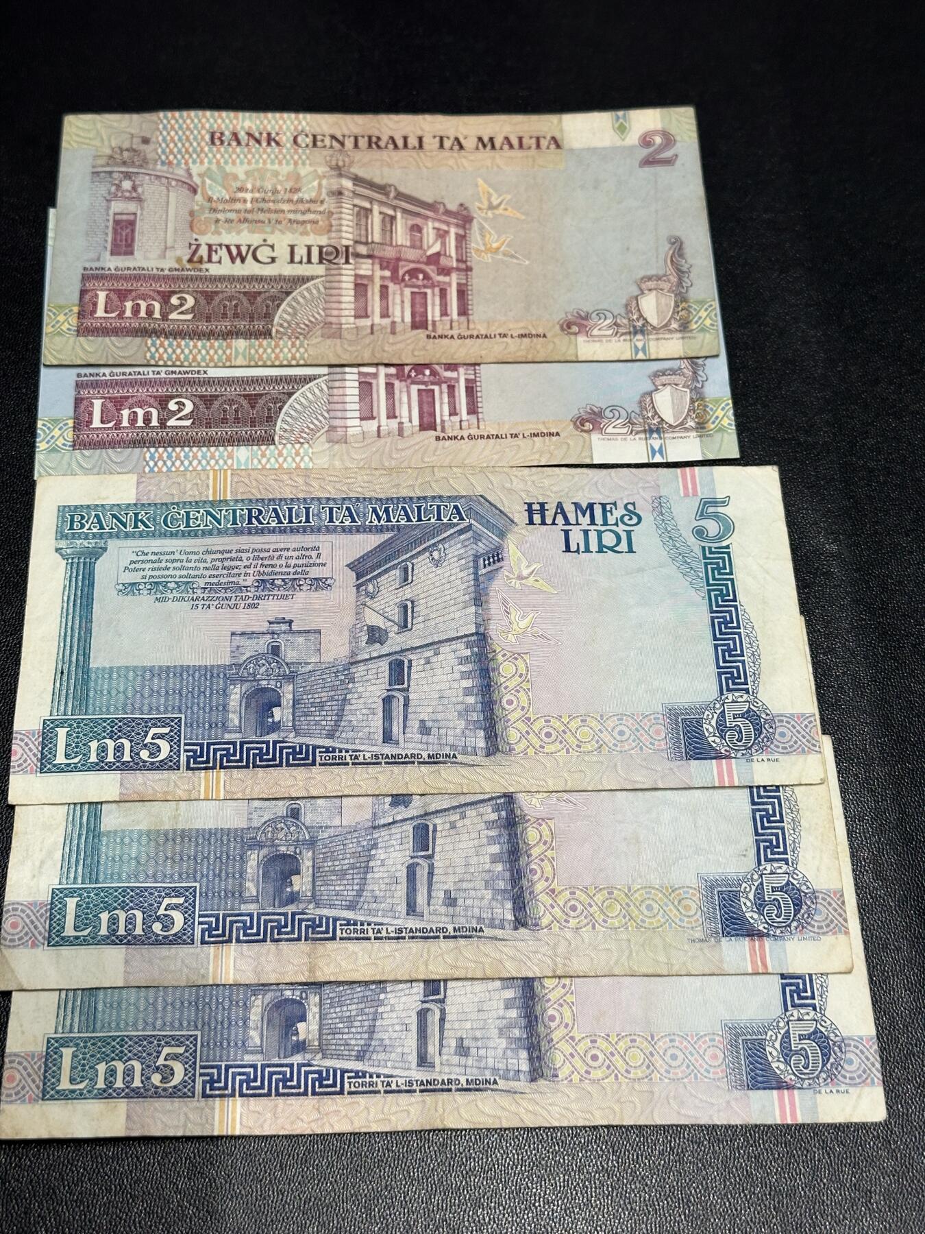 《外钞收藏家》第六百一十九期（精品场）（长期征集拍品、欢迎藏友们联系合作） 马耳他2里拉2张+5里拉3张一起 非全新 品相如图