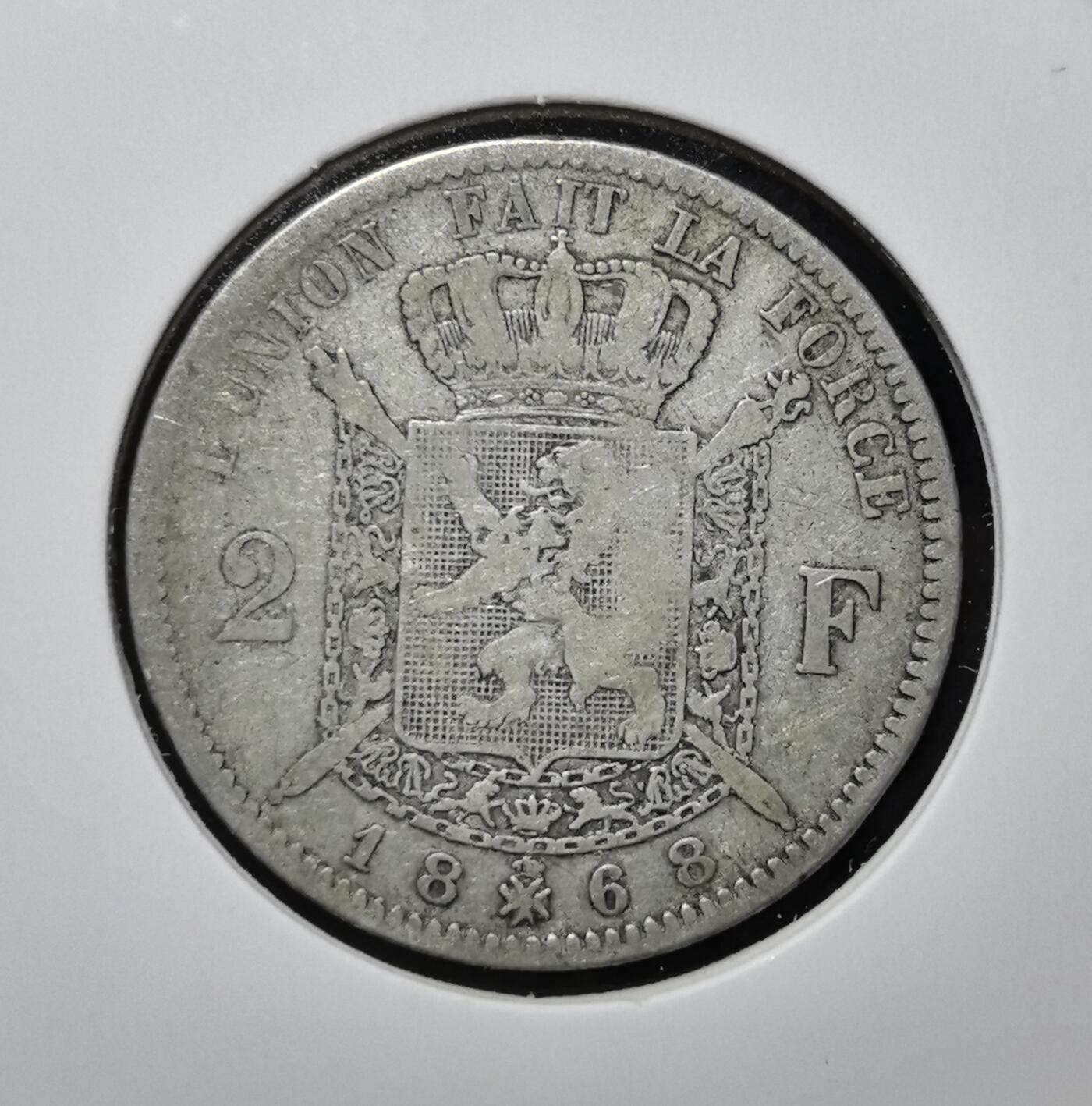 外国优质老铜币银币苏联纪念章，每周六晚九点倒数截拍，满百包邮可寄存，持续收拍 比利时1868年2法郎银币，由利奥波德二世统治时期铸造。正面为国王头像，背面是国徽与 “团结就是力量” 格言，属比利时君主制时期流通币。