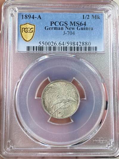 万国钱币拍卖第063期 - PCGS MS64 1894德属新几内亚天堂鸟1/2马克银币 德属大名誉品种 炫技式的华丽天堂鸟雕刻 原味包浆黄油转光 顶级收藏品质