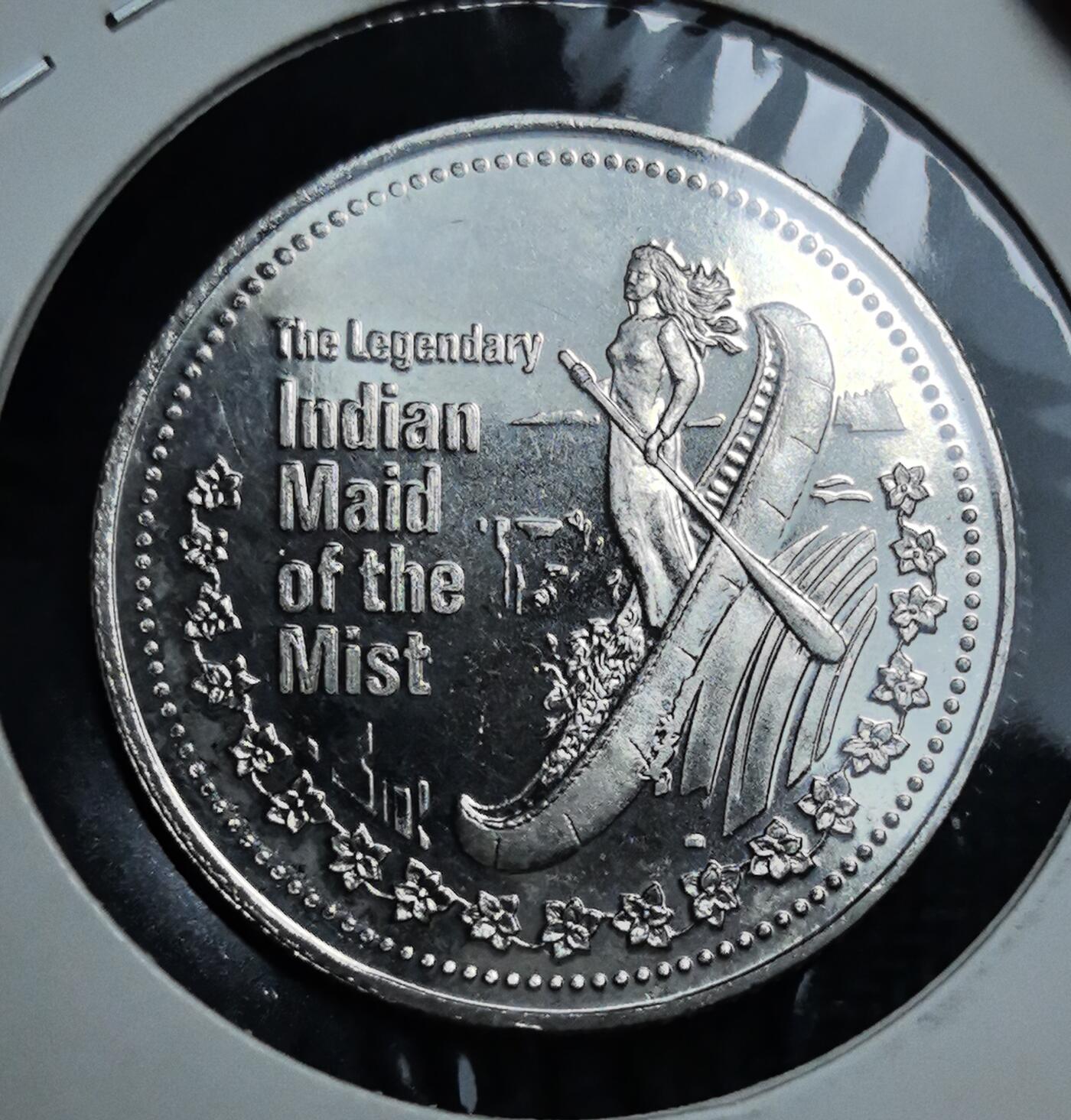 外国优质老铜币银币苏联纪念章，每周六晚九点倒数截拍，满百包邮可寄存，持续收拍 加拿大1981年尼亚加拉瀑布贸易元，正面刻画 “雾中少女” 印第安传说，背面铸城市徽章与尼亚加拉大瀑布景观，兼具北美原住民传说与地域地标，是北美旅游纪念代币的特色收藏品种。