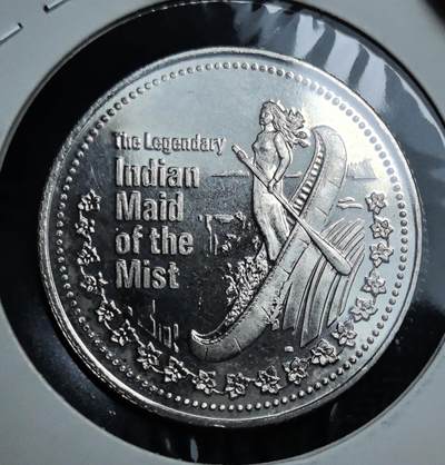 外国优质老铜币银币苏联纪念章，每周六晚九点倒数截拍，满百包邮可寄存，持续收拍 - 加拿大1981年尼亚加拉瀑布贸易元，正面刻画 “雾中少女” 印第安传说，背面铸城市徽章与尼亚加拉大瀑布景观，兼具北美原住民传说与地域地标，是北美旅游纪念代币的特色收藏品种。