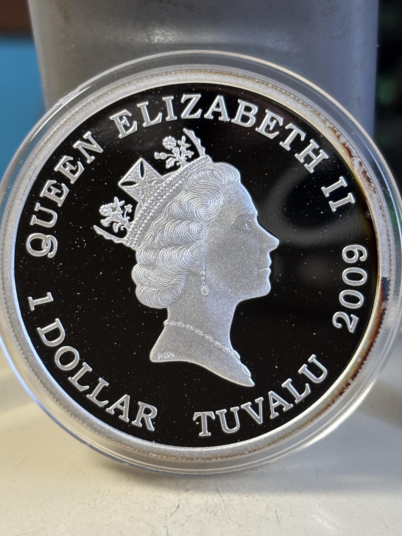 第194期拍卖 图瓦卢2009年芭比娃娃诞生50周年1盎司纪念彩银币,9999银，发行20000枚，有氧化