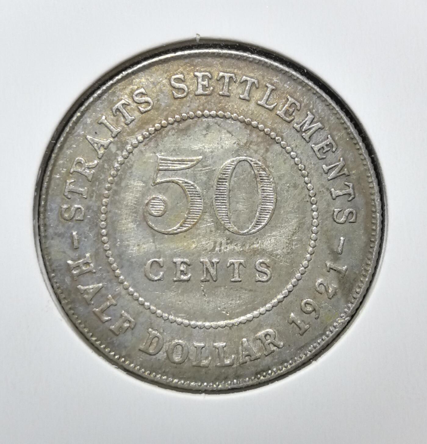 外国优质老铜币银币苏联纪念章，每周六晚九点倒数截拍，满百包邮可寄存，持续收拍 英属海峡殖民地1921年50分银币，正面为英王乔治五世头像及 “印度皇帝” 头衔，背面标注面值，见证英国对东南亚殖民贸易的历史。