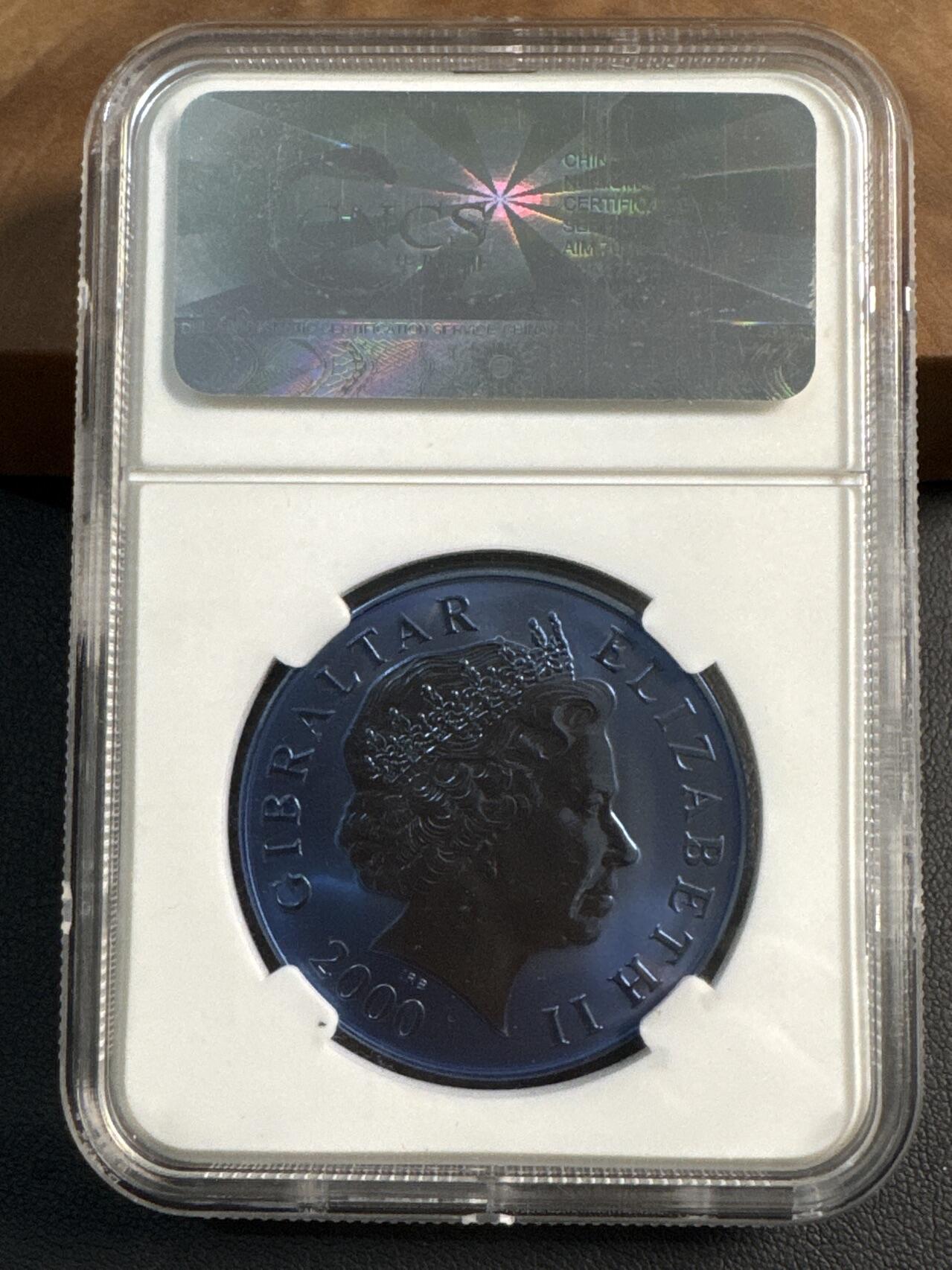 ❤️【币观天下】❤️ 第345期钱币拍卖场- 2026.3.20周五晚上6点半场 长期征集拍品  2000年直布罗陀（英）5镑蓝钛币 统一便士邮政160周年纪念 10克纯钛 发行量：1万5千 CNCS PF69