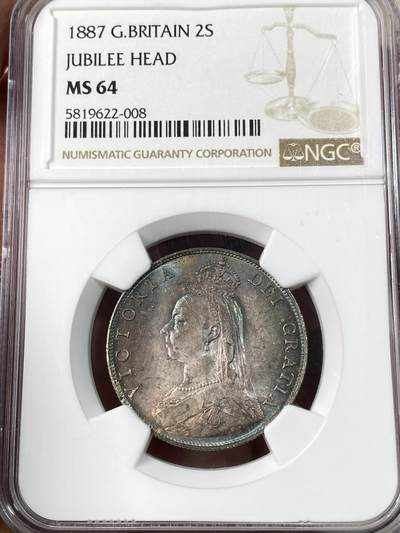 万国钱币拍卖第063期 - NGC MS64 1887英国维多利亚高冠2先令银币 浓郁渐变式英伦虹彩包浆环绕 丝绸转光绝美收藏级