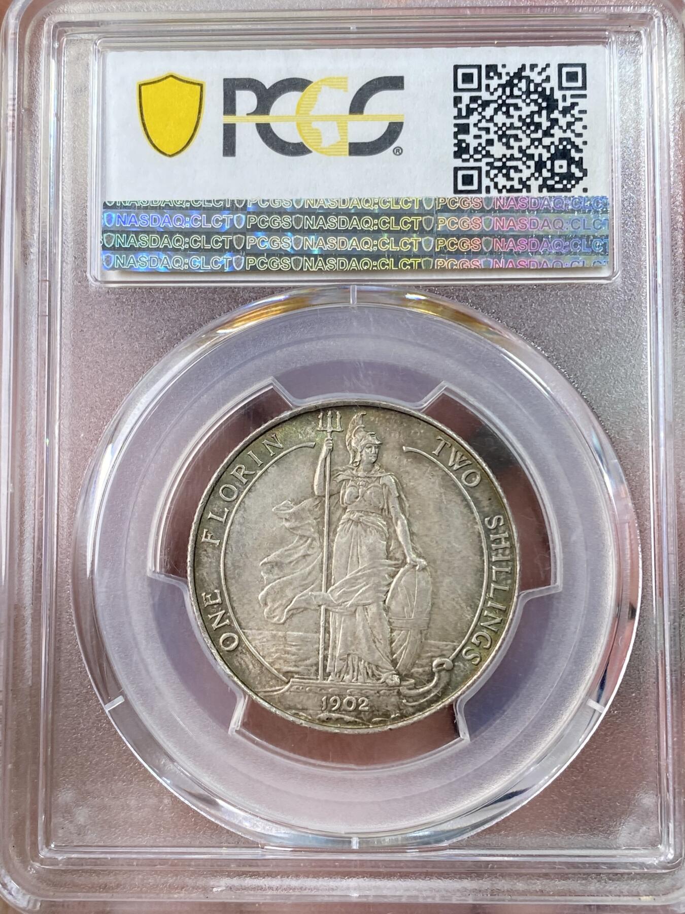 万国钱币拍卖第063期 PCGS MS64 1902年英国爱德华七世海神2先令 十字转光孔雀绿环彩非常漂亮