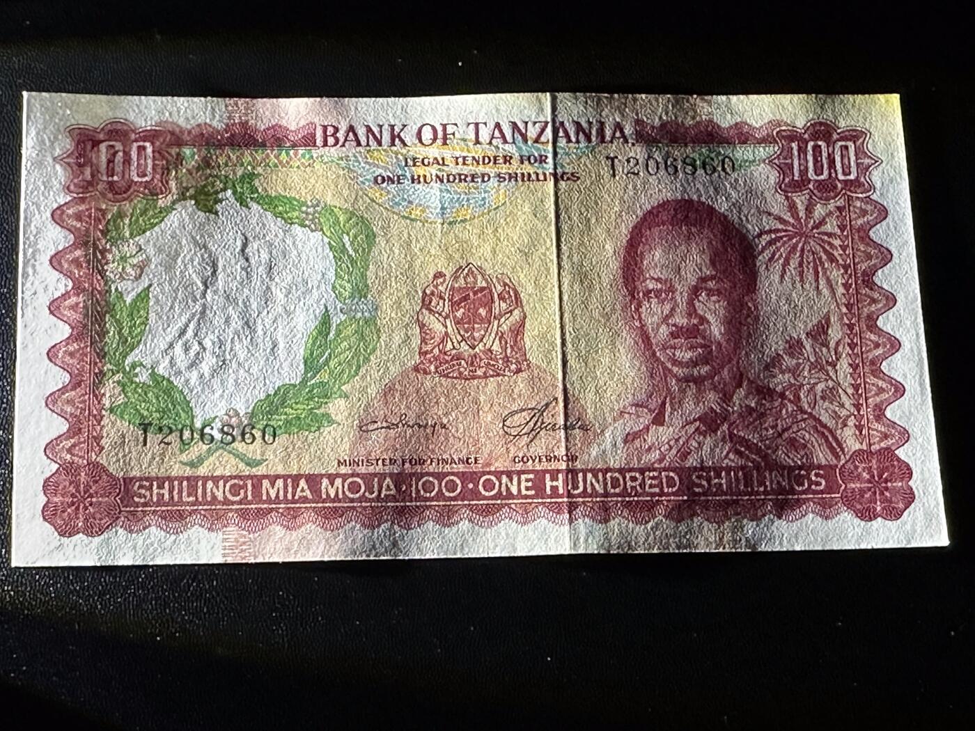 《外钞收藏家》第六百一十九期（精品场）（长期征集拍品、欢迎藏友们联系合作） 坦桑尼亚100先令 无47靓号 UNC- 尾860