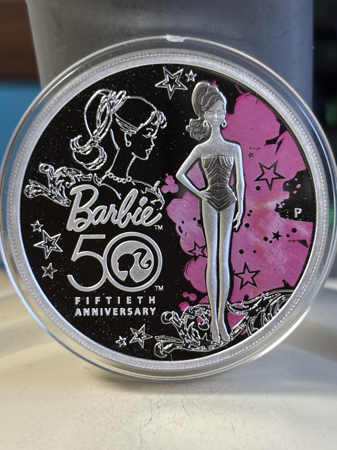 第194期拍卖 图瓦卢2009年芭比娃娃诞生50周年1盎司纪念彩银币,9999银，发行20000枚，有氧化