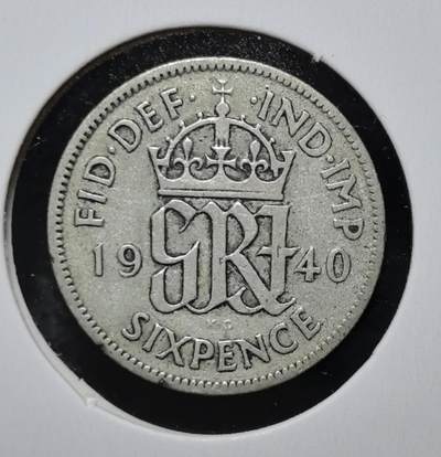 外国优质老铜币银币苏联纪念章，每周六晚九点倒数截拍，满百包邮可寄存，持续收拍 - 英国乔治六世1940年6便士银币。正面为国王头像，背面是国王花押与王冠，是二战时期英国流通货币，见证战时经济与殖民体系。