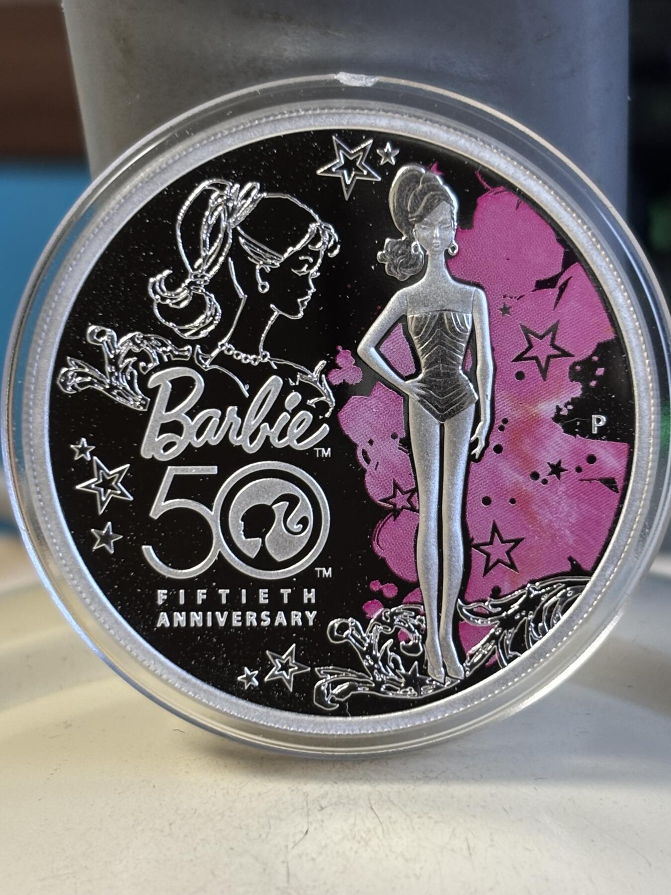 第194期拍卖 图瓦卢2009年芭比娃娃诞生50周年1盎司纪念彩银币,9999银，发行20000枚，有氧化