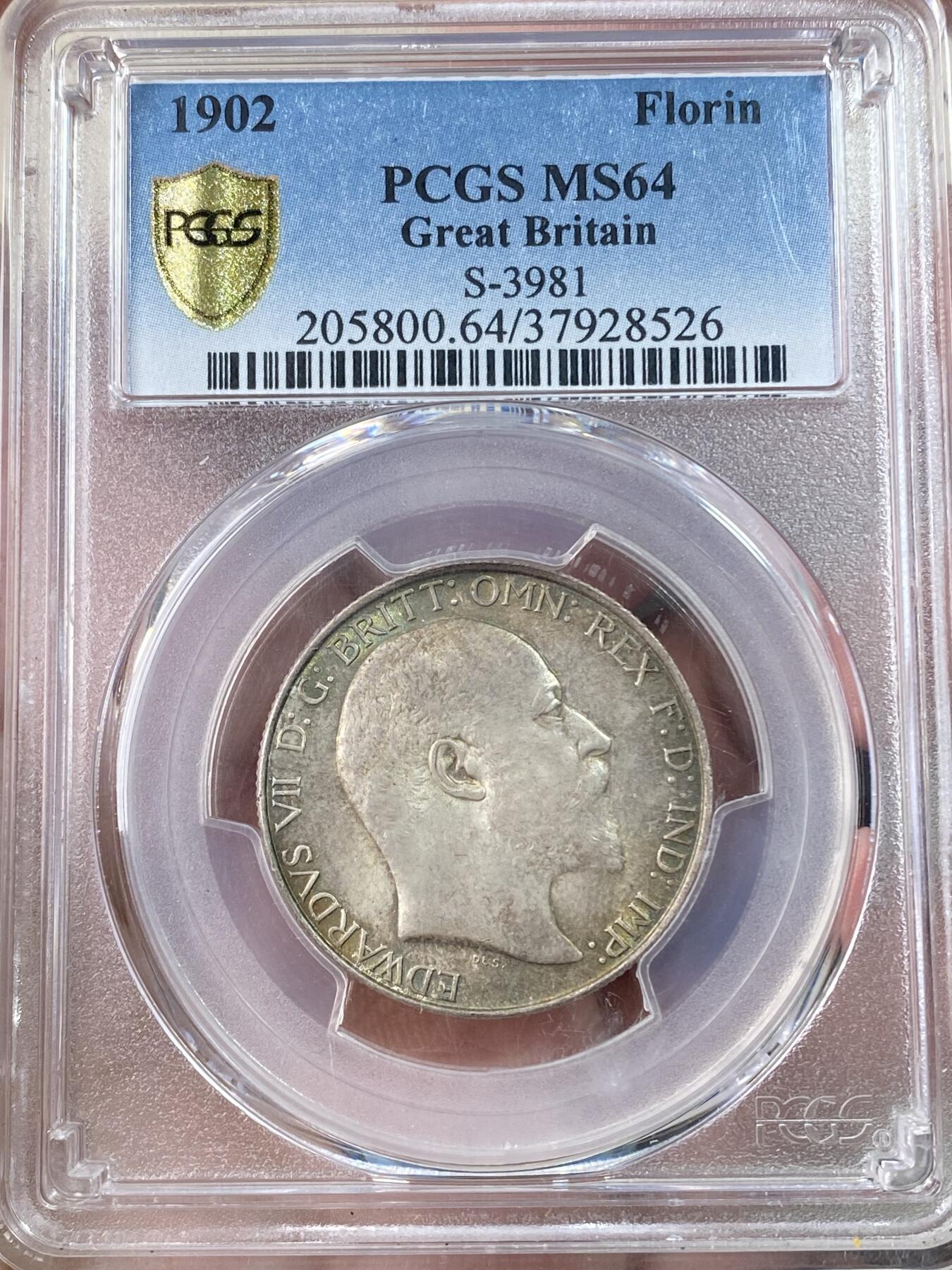 万国钱币拍卖第063期 PCGS MS64 1902年英国爱德华七世海神2先令 十字转光孔雀绿环彩非常漂亮
