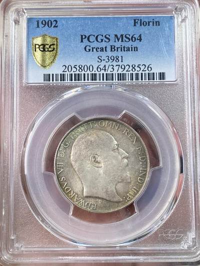 万国钱币拍卖第063期 - PCGS MS64 1902年英国爱德华七世海神2先令 十字转光孔雀绿环彩非常漂亮