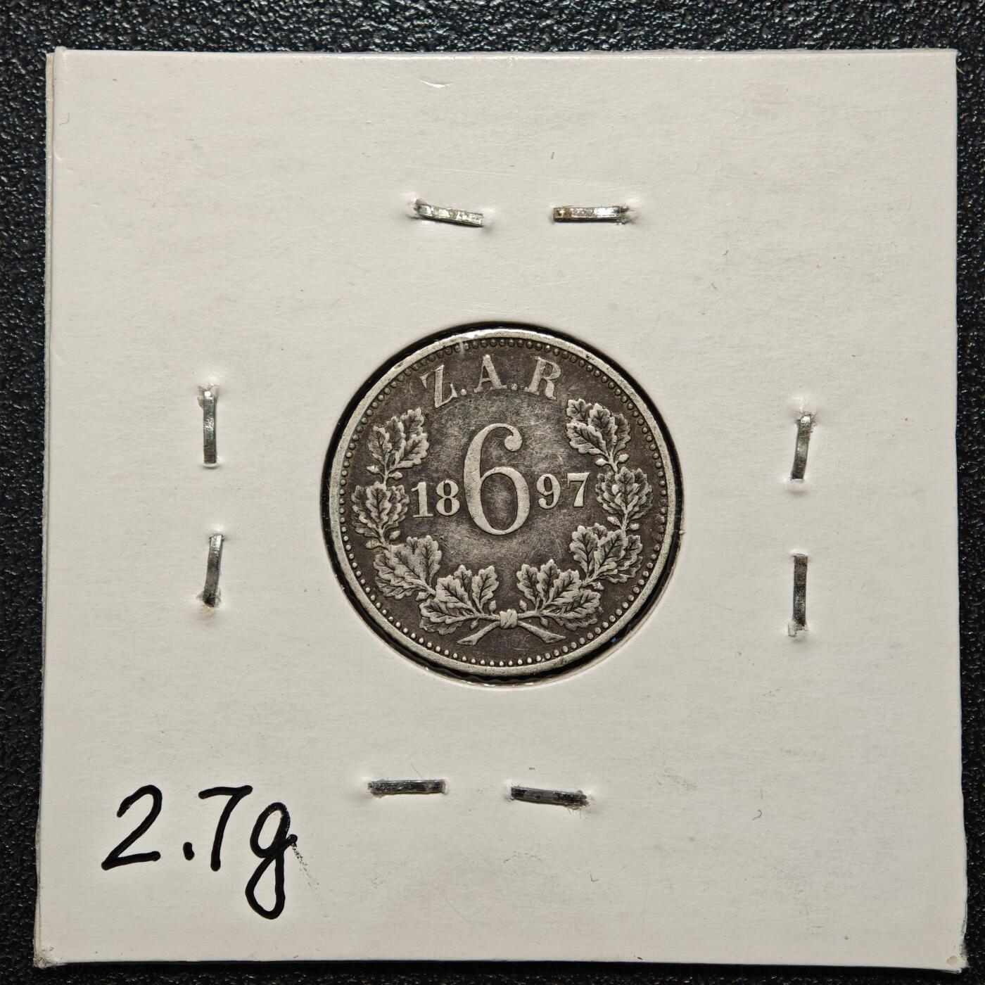 【德藏】世界币章拍卖第168期（拍品征集中~欢迎藏友联系） 老藏家集藏系列之- 1897年 南非(德兰士瓦)6便士银币 925银 直径约：19mm；重约：2.8g 入册20余年·附有当年购入价