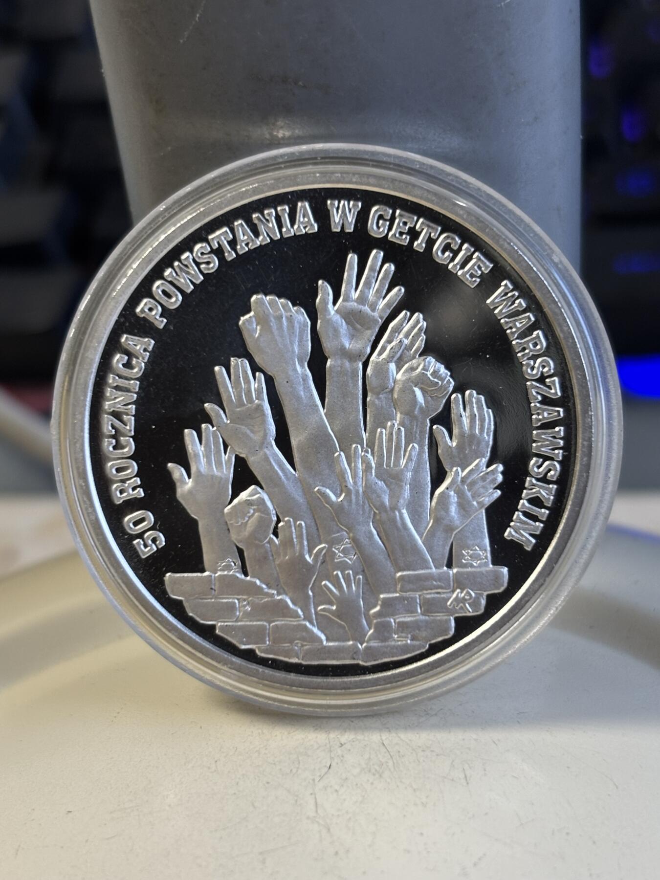 第194期拍卖 获奖币 波兰1993年华沙犹太区起义50周年精制纪念银币 1995年克劳斯最富激情币，925银，1盎司