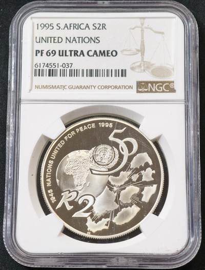 甄臻铺-世界币章拍卖（第55期），3月28日甄品场（直播拍卖）拍品征集中，送拍享返佣金等优惠多多 - 1995年南非纪念联合国成立50周年2兰特精制银币，33.6克925银