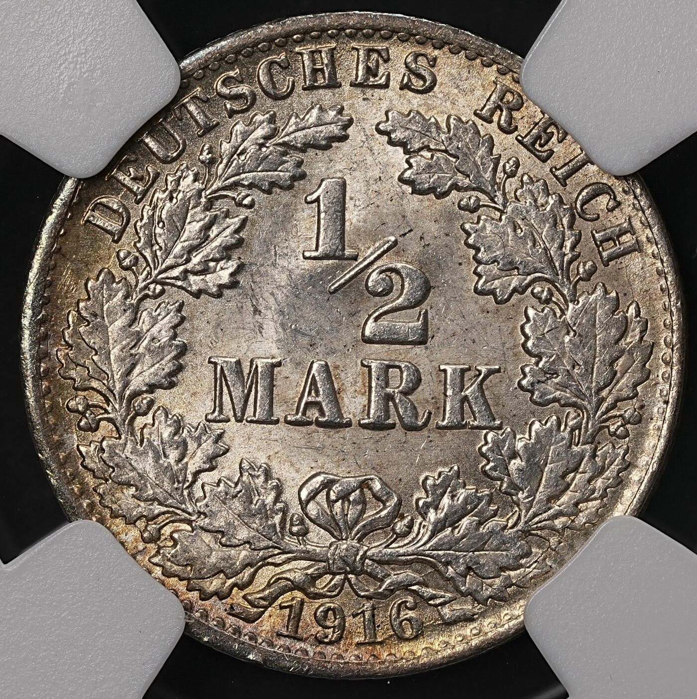 修遠堂世界钱币第108期 NGC MS65 1916年德国1/2马克银币 A厂铭，淡彩