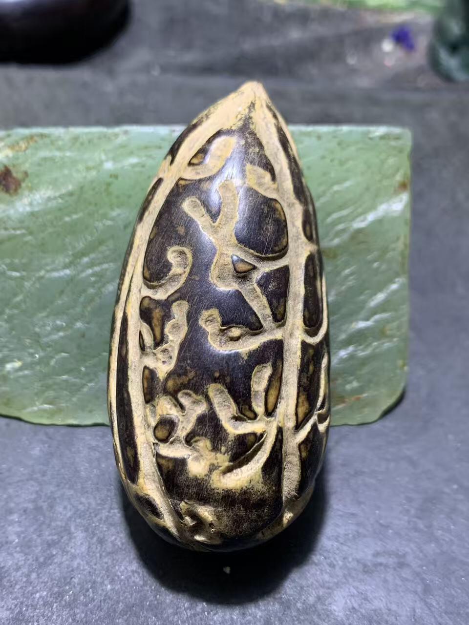 精美千眼菩提黑果把件一个，