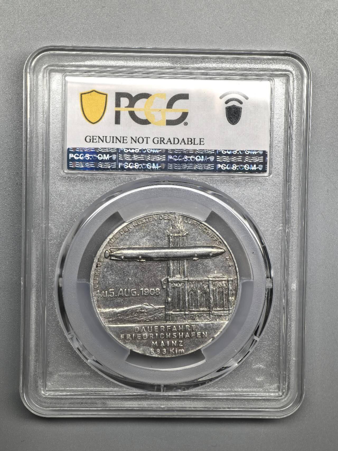 小驴勋章奖章收藏3月21日周六晚六点拍卖（珍爱和平，收藏战争，铭记历史，勿忘国耻，忠党爱国。有偿代拍，送拍规则在简介最后，参拍须阅读规则后再参拍，关系到运费包装发货时效真假辨别等关键信息，拍卖时不再发原图，看大图店主微信码在拍卖店铺介绍里） PCGS评级SP UNC评分齐柏林飞艇纪念章，由卡尔·贝格公司（吕登沙伊德）于1908年铸造，使用被毁的齐柏林飞艇LZ4的残骸金属铸造，少见