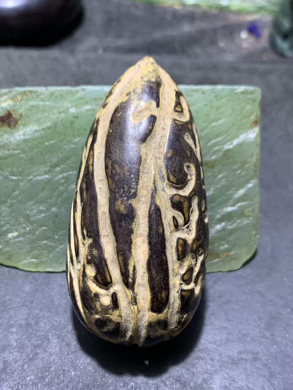 精美千眼菩提黑果把件一个，