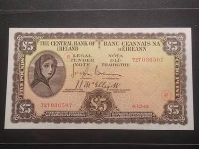 2026三月第三期，总第220期 - 爱尔兰1943年5镑AUNC，早期下方有英爱两国货币互换协议的版本，以及加盖二战时期印刷的紧急识别字母，爱尔兰人格化象征“拉维利夫人”，稀有战时中高面值
