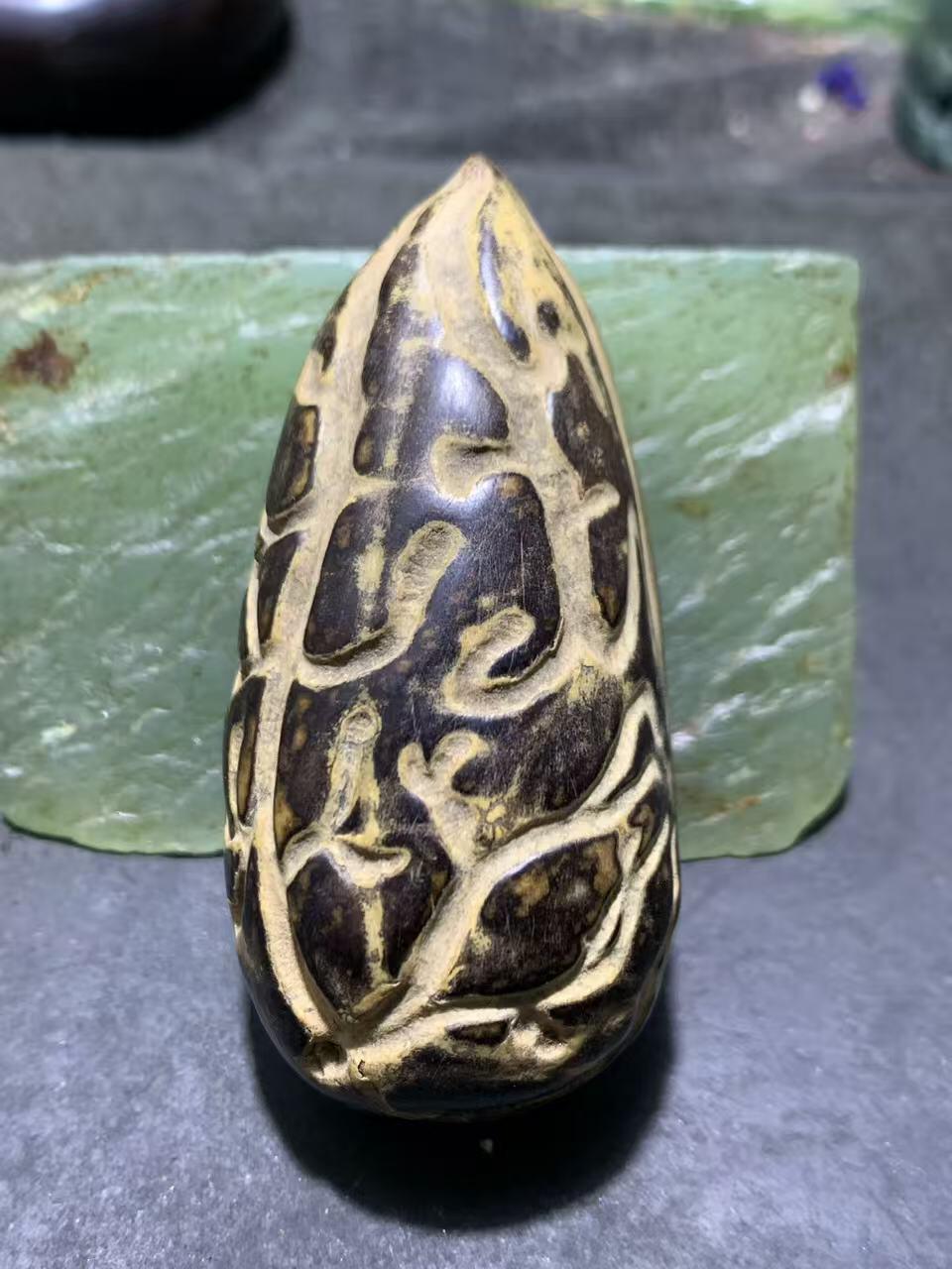 精美千眼菩提黑果把件一个，