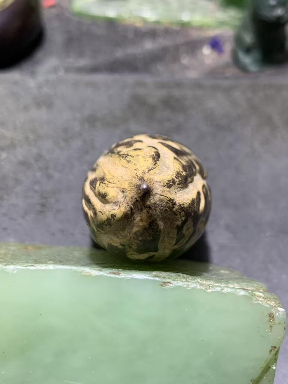 精美千眼菩提黑果把件一个，