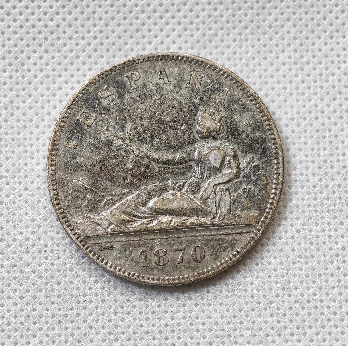 甄臻铺-世界币章拍卖（第55期），3月28日甄品场（直播拍卖）拍品征集中，送拍享返佣金等优惠多多 西班牙 1870年 5比塞塔 拿花女神 银币