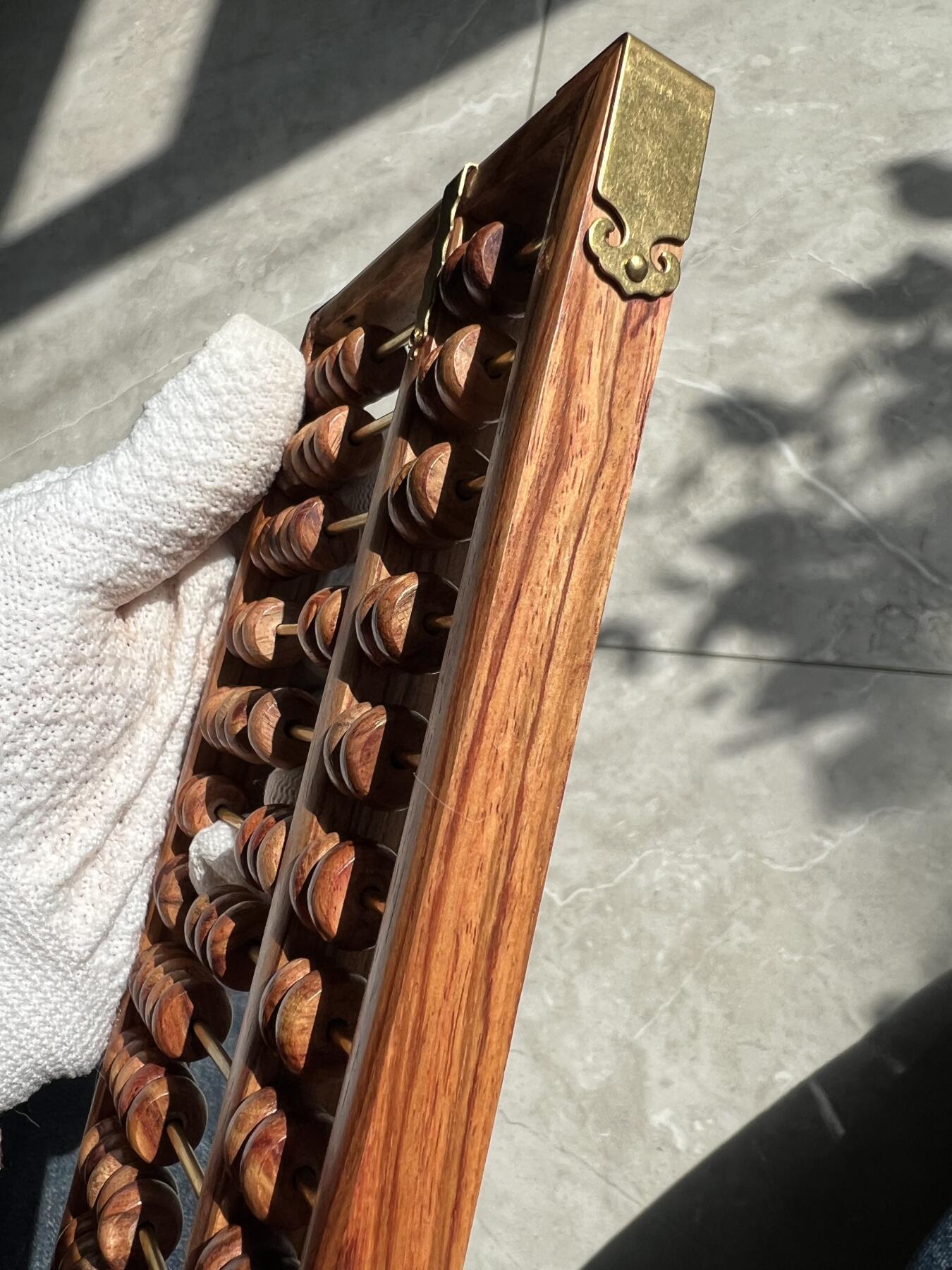 零元拍：“算盘一响，黄金万两”海南黄花梨十三档算盘。尺寸：203/93/13.5MM