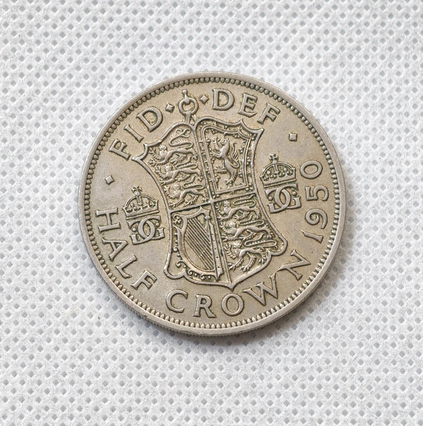 甄臻铺-世界币章拍卖（第55期），3月28日甄品场（直播拍卖）拍品征集中，送拍享返佣金等优惠多多 1950年英国半克朗大币