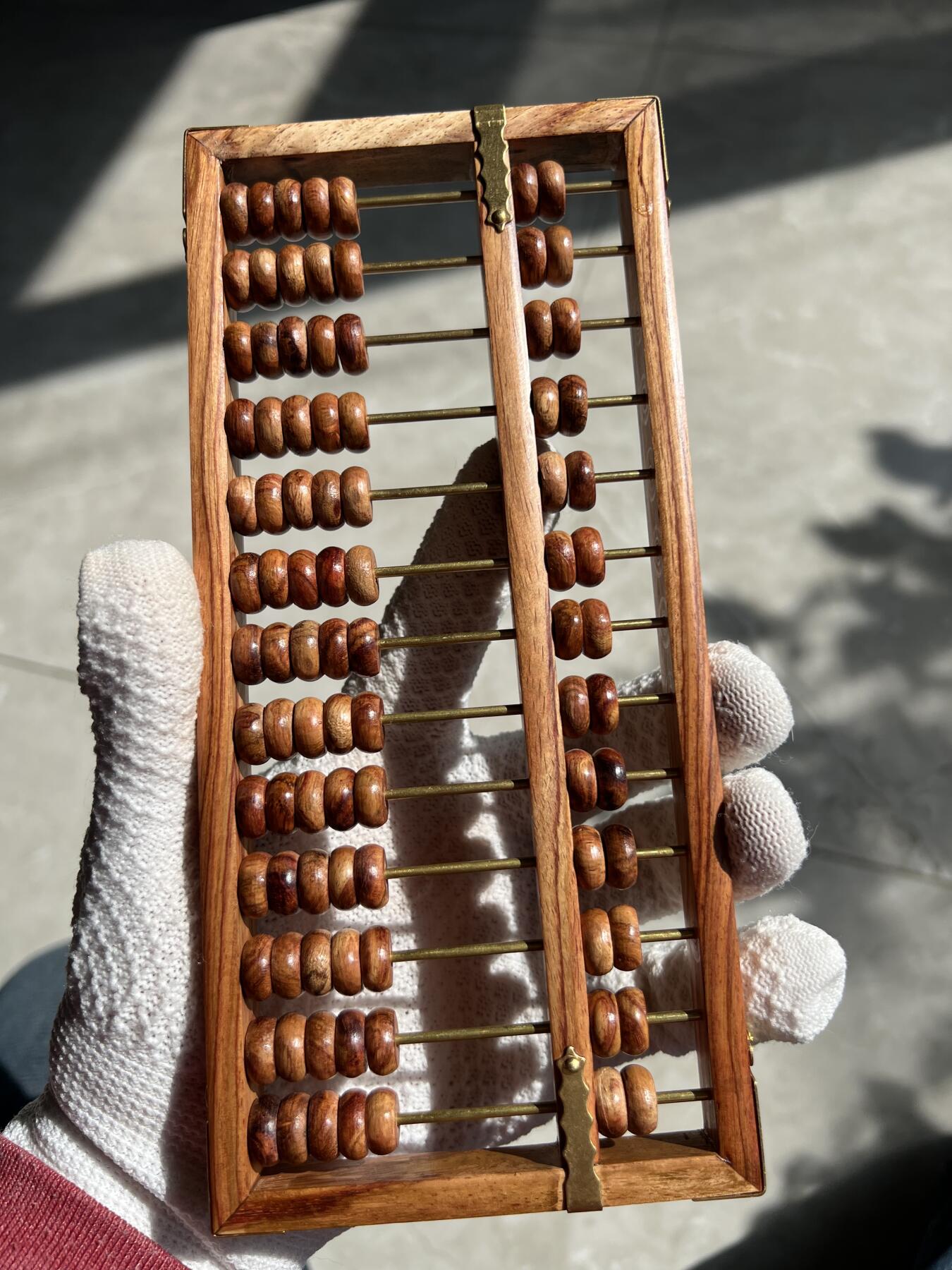 零元拍：“算盘一响，黄金万两”海南黄花梨十三档算盘。尺寸：203/93/13.5MM