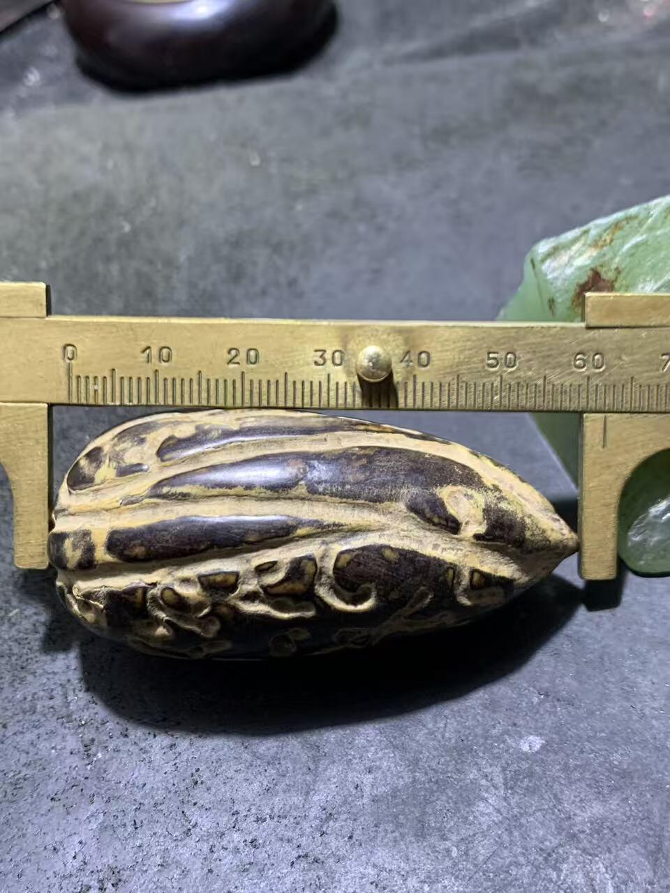 精美千眼菩提黑果把件一个，