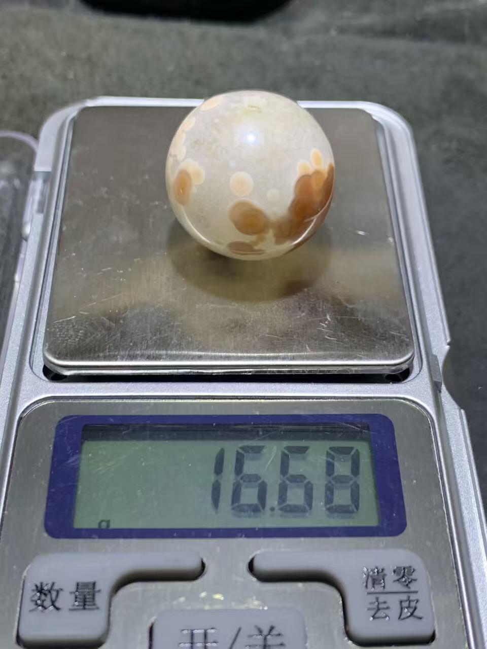 精美高玉化冰飘糖心料气泡纹战国红玛瑙随形圆珠一个！