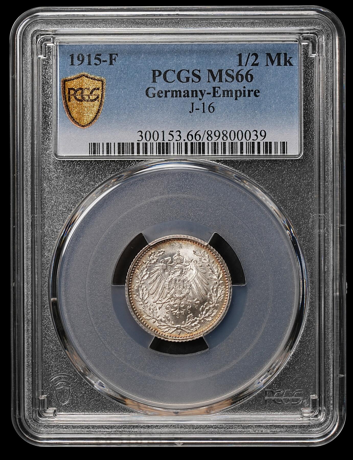 修遠堂世界钱币第108期 PCGS MS66 1915年德国1/2马克银币，F厂铭，同一原卷头一次送评级都是67-68，这次送惨被压分，这枚绝不是66的状态，极品环彩