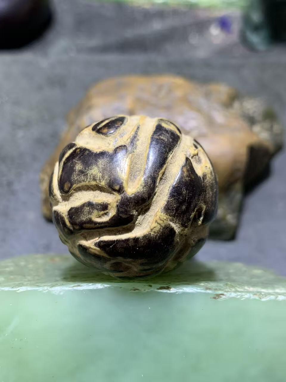 精美千眼菩提黑果把件一个，