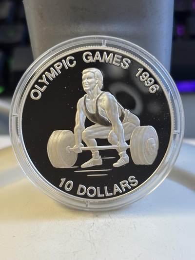 第194期拍卖 - 瑙鲁1995发行96年奥运会举重1盎司纪念银币，925银