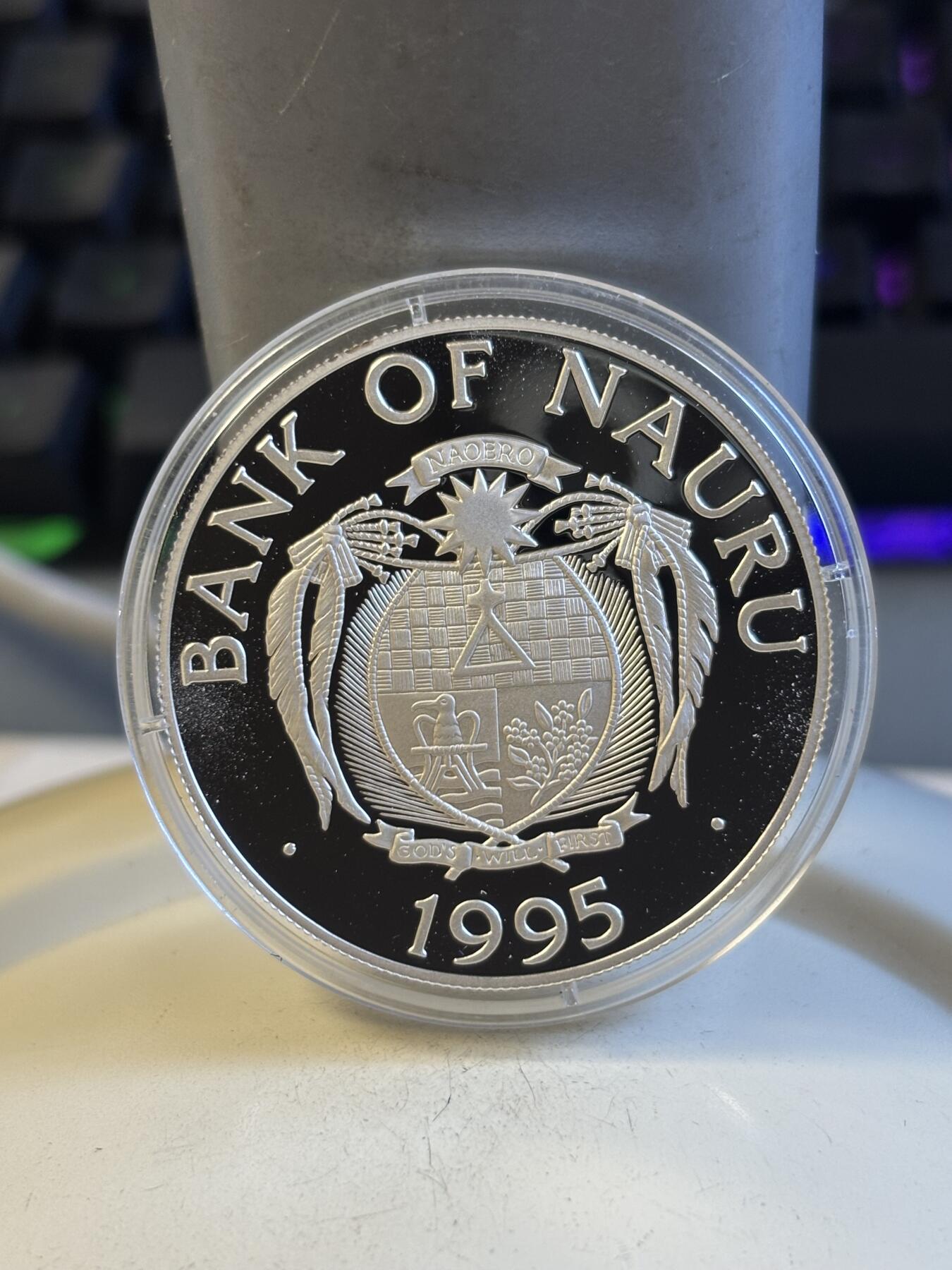 第194期拍卖 瑙鲁1995发行96年奥运会举重1盎司纪念银币，925银