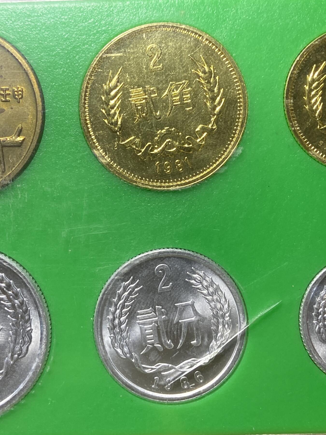 2026年第三十七场(总第二百零六场）德紧纸币特拍场(佣金3%，最低1元) 鸽子重拍–上海造币厂装帧–1981年长城套币+分币+生肖铜章共8枚：1981年1元5角2角1角，1986年1分2分，1989年5分，1992年猴年纪念章