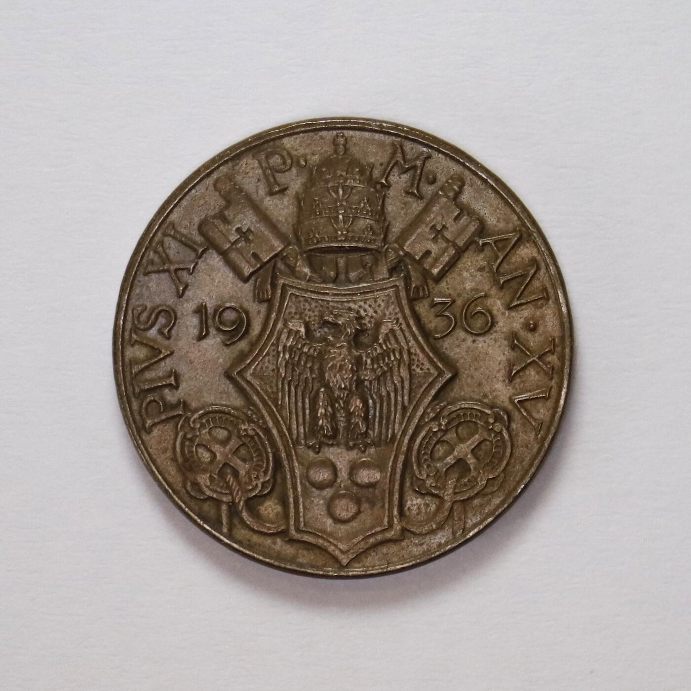 观钱 近现代机制币拍卖No.005（全场顺丰包邮，不区分偏远地区）  梵蒂冈 1936 年庇护十一世 （圣徒主题）10 分铜币  长髯圣徒（常被认为是圣保罗或圣伊格纳修斯）左侧面高浮雕肖像，发丝与胡须纹理细腻，身后带有光环，神态庄严。