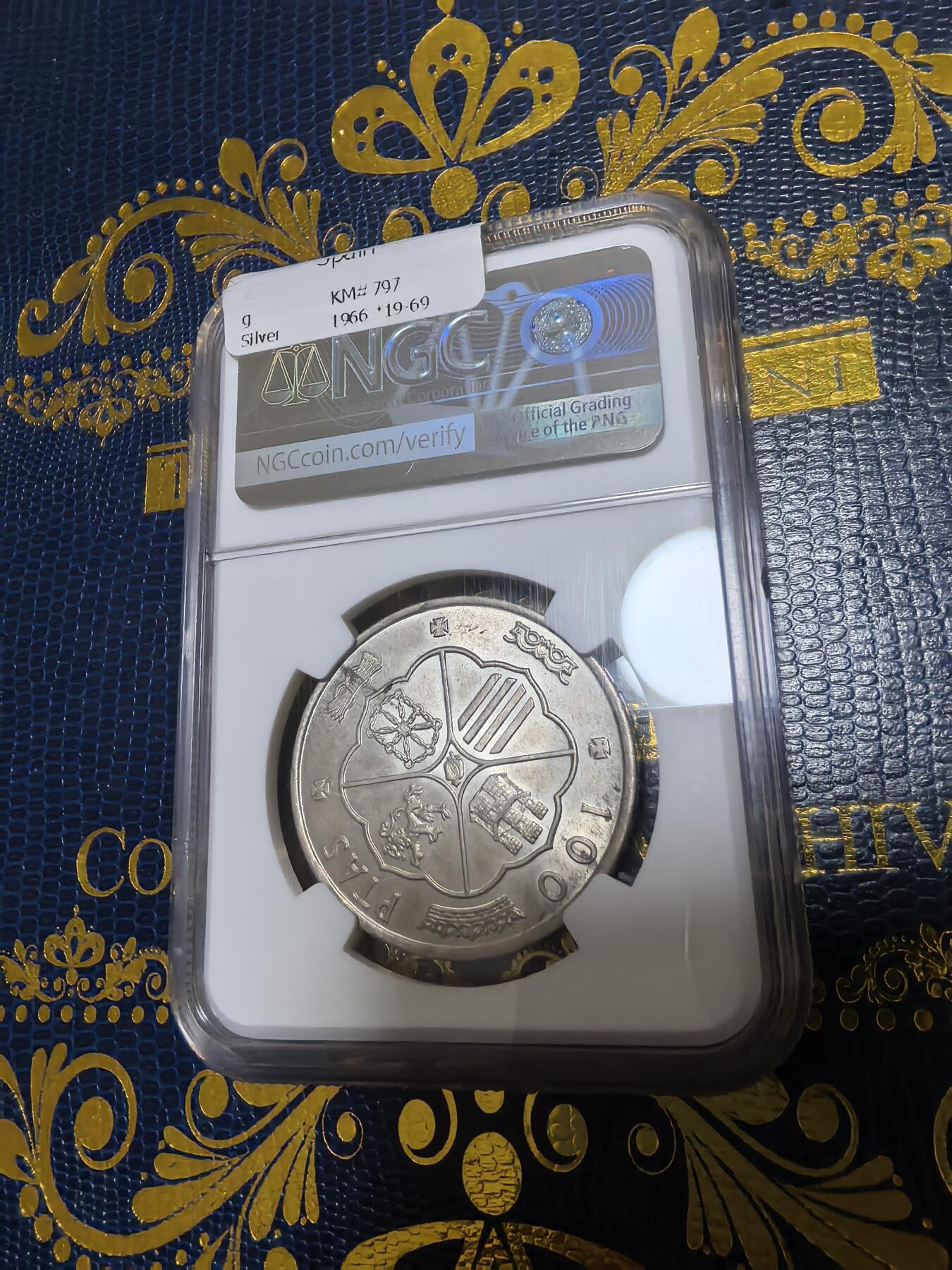 长老汇马年精选第十二场拍卖 1966(69)西班牙弗朗哥100比塞塔银币，NGC MS64，季军，更高8枚，版别曲“9”，外网购的，非常贵，NGC官网63分200美金